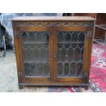 OAK PRIORY STYLE TWO DOOR LEADED GLASS BOOKCASE