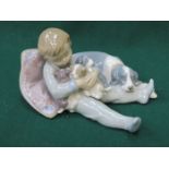 LLADRO GLAZED CERAMIC FIGURE GROUP OF A YOUNG BOY,