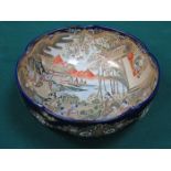 CERAMIC WAVE EDGED BOWL DECORATED WITH ORIENTAL FIGURES, SIGNED TO BASE,