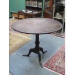 ANTIQUE OAK CIRCULAR TABLE ON TRIPOD SUPPORTS