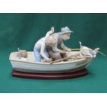 LLADRO GLAZED CERAMIC FIGURE GROUP - FISHING WITH GRAMPS ON WOODEN PLINTH NO 5215