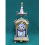 PRETTY FRENCH STYLE GILT METAL MANTLE CLOCK WITH HAND PAINTED AND GILDED PORCELAIN DIAL AND PANEL,