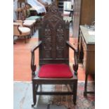 HEAVILY CARVED OAK GOTHIC STYLE ARMCHAIR