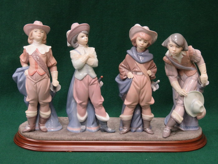 SET OF FOUR LLADRO GLAZED CERAMIC FIGURES - THE FOUR MUSKETEERS ON WOODEN PLYNTH