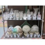 LARGE QUANTITY OF VARIOUS GLASSWARE INCLUDING LAMP SHADE, BOTTLES, DRINKING GLASSES, ETC.