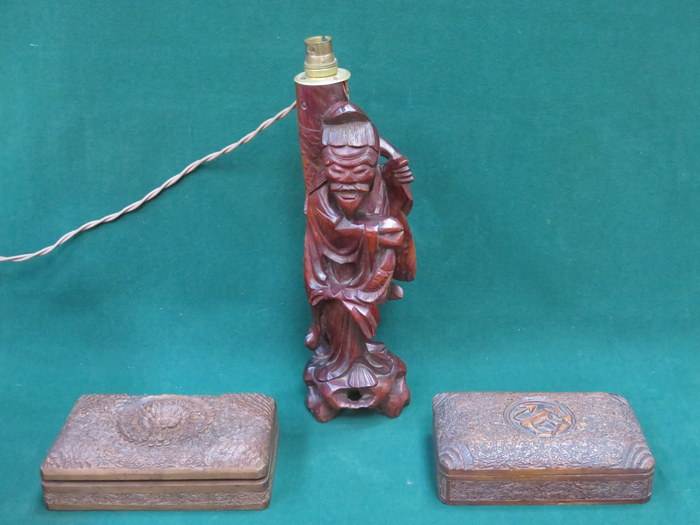 CARVED TREEN ORIENTAL TABLE LAMP AND TWO CARVED TREEN STORAGE BOXES