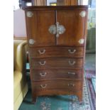 ANTIQUE MAHOGANY SERPENTINE FRONTED LINEN CHEST WITH FOUR DRAWERS AND TWO CUPBOARD DOORS WITH BRASS