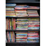 THREE SHELVES CONTAINING LARGE QUANTITY OF CHILDREN'S ANNUALS INCLUDING RUPERT, THUNDERBIRDS,