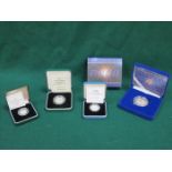 FOUR VARIOUS CASED ROYAL MINT SILVER PROOF COINS INCLUDING 5p COIN, 10p COIN,