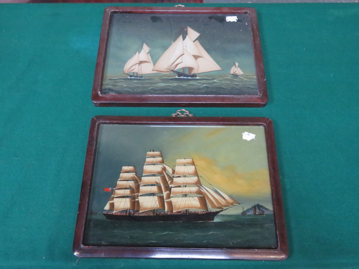 PAIR OF PAINTINGS ON GLASS IN ORIENTAL STYLE FRAMES DEPICTING GALLEONS