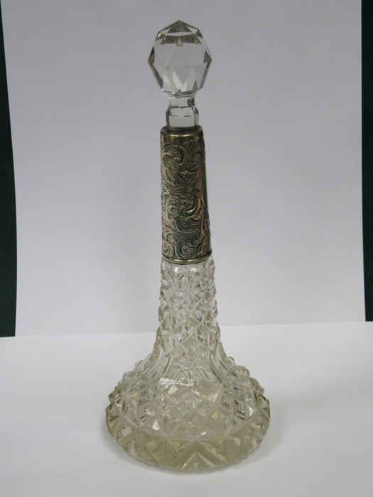 DECORATIVE GLASS PERFUME BOTTLE WITH SILVER COLOURED MOUNT