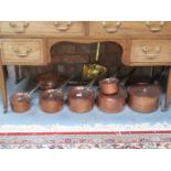 SET OF GRADUATED ANTIQUE PANS AND CHESTNUT ROASTER AND BED WARMING PAN