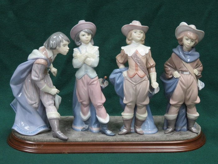 SET OF FOUR LLADRO GLAZED CERAMIC FIGURES - THE FOUR MUSKETEERS ON WOODEN PLYNTH