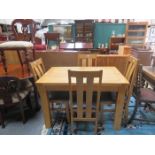 MODERN PINE EXTENDING KITCHEN TABLE AND FOUR CHAIRS