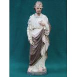 UNGLAZED PAINTED AND GILDED CERAMIC FIGURE DEPICTING ST JOSEPH,