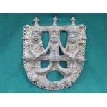 RELIEF DECORATED CAST IRON BONZE NATIVE NIGERIAN WALL PLAQUE FEATURING THREE FIGURES,