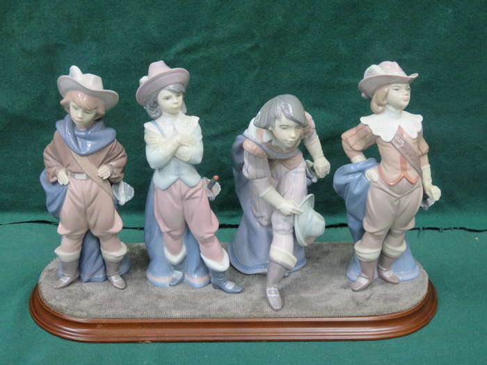 SET OF FOUR LLADRO GLAZED CERAMIC FIGURES - THE FOUR MUSKETEERS ON WOODEN PLYNTH