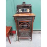 MAHOGANY CARVED FRONTED MUSIC CABINET.