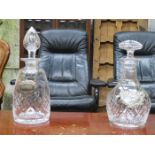 TWO GLASS DECANTERS WITH SILVER PLATED LABELS