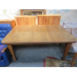 ANTIQUE OAK WIND OUT DINING TABLE WITH ONE LEAF.