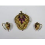 UNHALLMARKED VICTORIAN STYLE GOLD COLOURED BROOCH SET WITH AMETHYST AND MATCHING EARRINGS