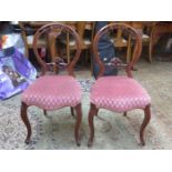 PAIR OF CARVED PIERCEWORK DECORATED VICTORIAN MAHOGANY BALLOON BACK CHAIRS