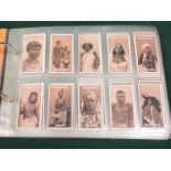 ALBUM OF ANSTIE'S CIGARETTE CARDS INCLUDING PEOPLE OF AFRICA, PEOPLE OF EUROPE, DOWNLAND, ETC.