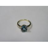 9ct GOLD LADIES DRESS RING SET WITH OVAL AQUAMARINE COLOURED STONES