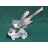 LLADRO GLAZED CERAMIC FIGURE GROUP OF TWO BIRDS.