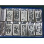 ALBUM OF VARIOUS CIGARETTE CARDS INCLUDING SUBBUTEO TABLE SOCCER, ZOO STAMPS, DOGS HEADS,