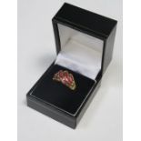 9ct GOLD LADIES DRESS RING SET WITH RUBY COLOURED STONES