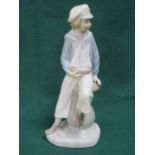 LLADRO GLAZED CERAMIC FIGURE OF A SEATED BOY WITH BOAT.
