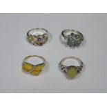 FOUR VARIOUS SILVER DRESS RINGS