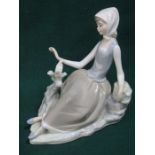 LLADRO GLAZED CERAMIC FIGURE OF A SEATED LADY WITH TURTLE DOVE