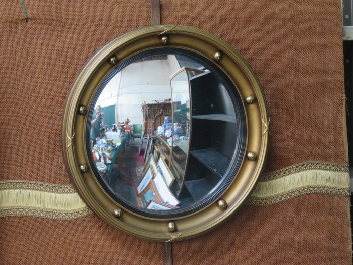 GLIDED CIRCULAR CONVEX WALL MIRROR.