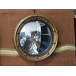 GLIDED CIRCULAR CONVEX WALL MIRROR.