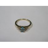 9k GOLD LADIES DRESS RING SET WITH AQUAMARINE AND SMALL CLEAR STONES
