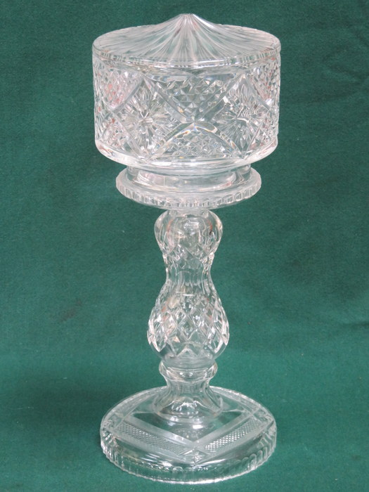 DECORATIVE GLASS LAMP BASE WITH SHADE.