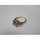 PRETTY 9k GOLD DRESS RING SET WITH LILAC COLOURED STONE