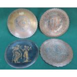 FOUR COPPER CIRCULAR PLAQUES WITH EGYPTIAN DECORATION