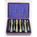 CASED SET OF FOUR SILVER PLATED NUT CRACKER AND PICK SET