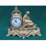 ITALIAN GILT METAL FIGURE FORM MANTLE CLOCK WITH ENAMELLED DIAL.