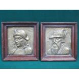 PAIR OF OAK FRAMED REPOUSSE BRASS WALL PLAQUES