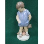 ROYAL COPENHAGEN GLAZED CERAMIC FIGURE OF A BOY WITH TEDDY BEAR, NUMBER 3468.