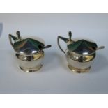 PAIR OF HALLMARKED SILVER MUSTARD POTS WITH SPOONS