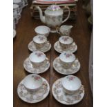 GILDED AND FLORAL FIFTEEN PIECE COFFEE SET