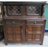 OAK LINEN FOLD FRONTED COURT CUPBOARD WITH LEAD GLASS DOORS