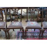 SET OF FOUR MAHOGANY DINING CHAIRS (AT FAULT)