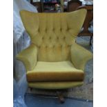 1970s STYLE UPHOLSTERED SWIVEL ARMCHAIR