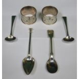 TWO SILVER NAPKIN RINGS AND TWO SILVER SPOONS